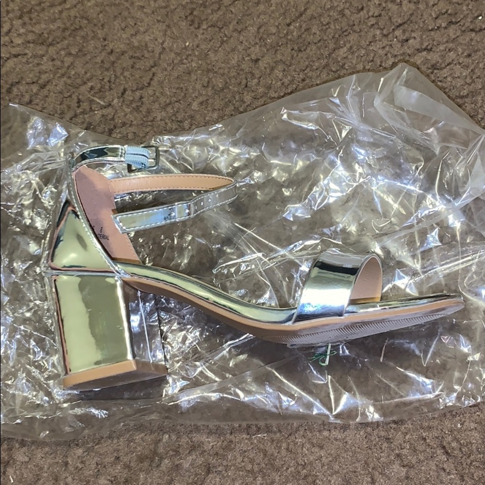 Metallic silver square heels. Size 6.5.